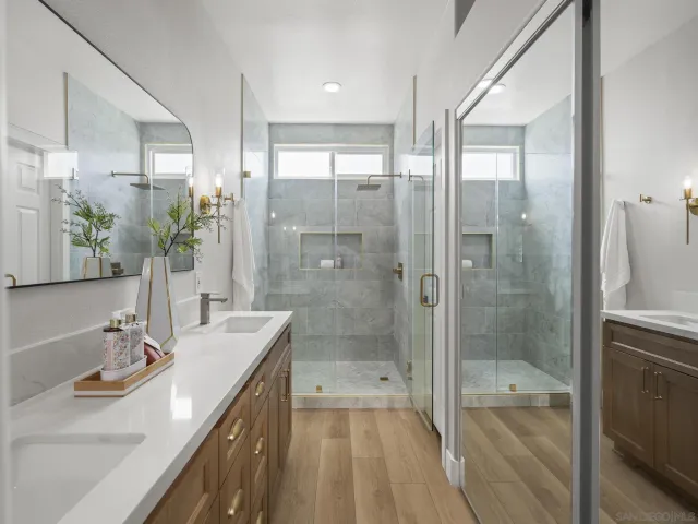 a bedroom with a large bed and a large window