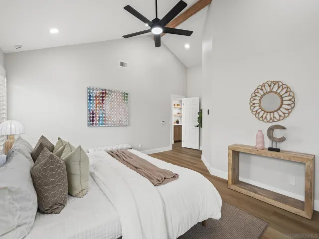 a view of a patio with table and chairs and potted plants