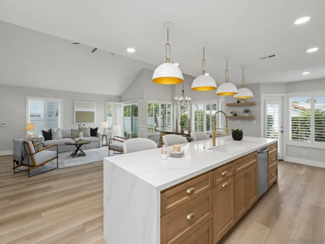 a very nice looking living room with a large window