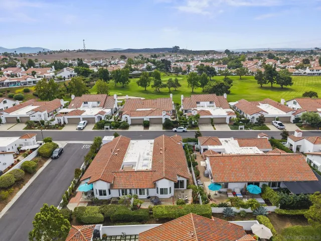a view of a street with cars