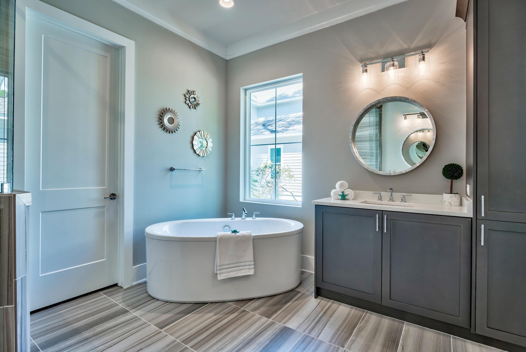 173 Defuniak Street Santa Rosa Beach, FL 32459 - Photo 14 of 28 a bathroom with a sink and a mirror