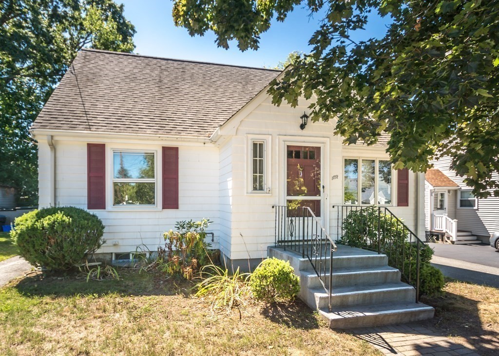 1172 Trapelo Road Waltham, MA 02451 - Photo 1 of 25 a front view of a house with garden