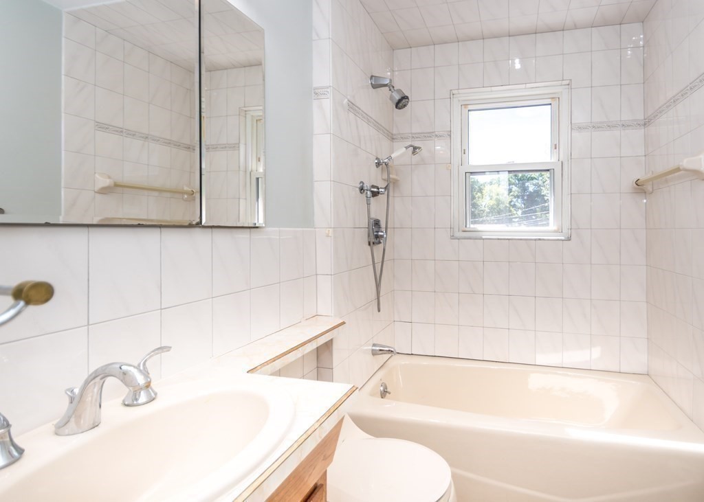 1172 Trapelo Road Waltham, MA 02451 - Photo 17 of 25 a bathroom with a sink and a bathtub