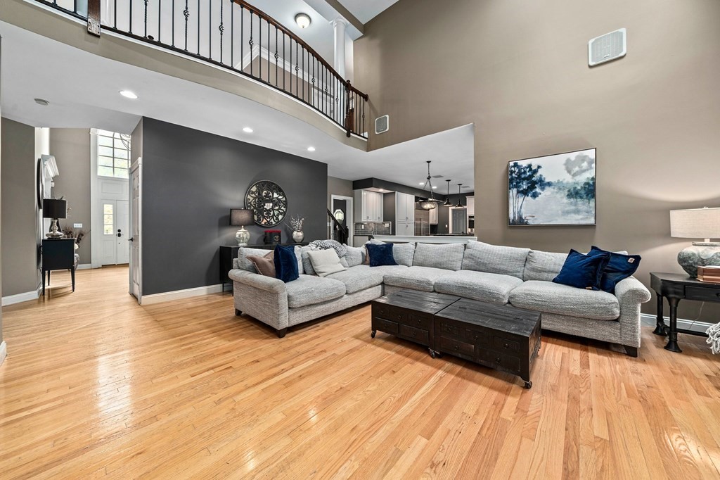 105 Waterman Road Canton, MA 02021 - Photo 12 of 39 a living room with furniture and a wooden floor