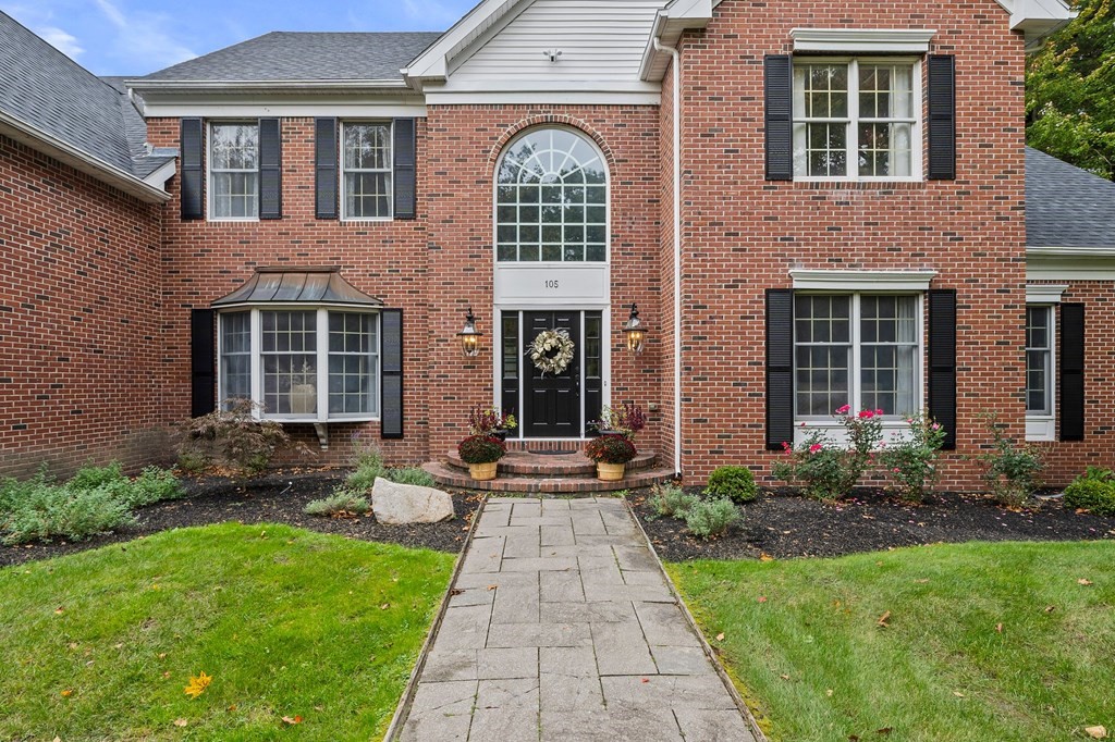 105 Waterman Road Canton, MA 02021 - Photo 2 of 39 a front view of a house with garden