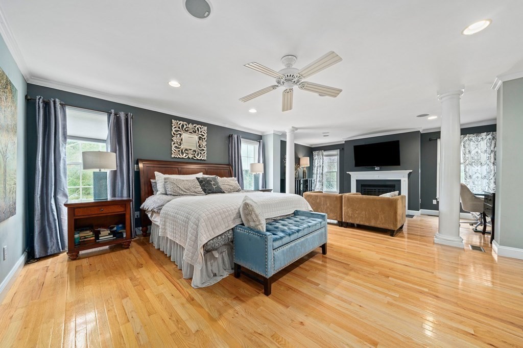 105 Waterman Road Canton, MA 02021 - Photo 24 of 39 a spacious bedroom with a bed wooden floor and window