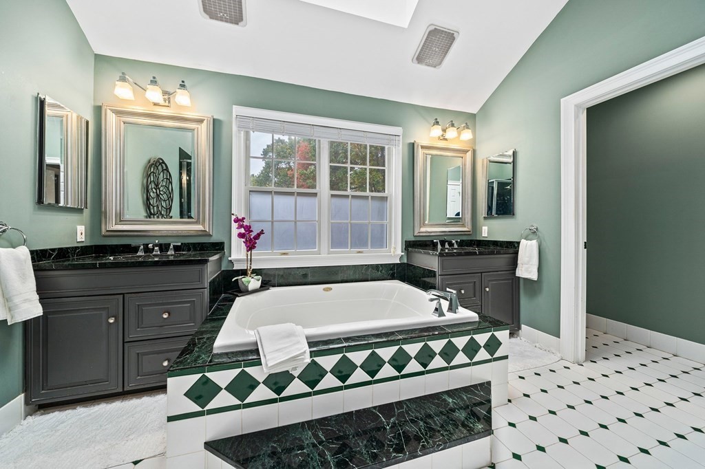 105 Waterman Road Canton, MA 02021 - Photo 25 of 39 a kitchen with a sink a stove and cabinets