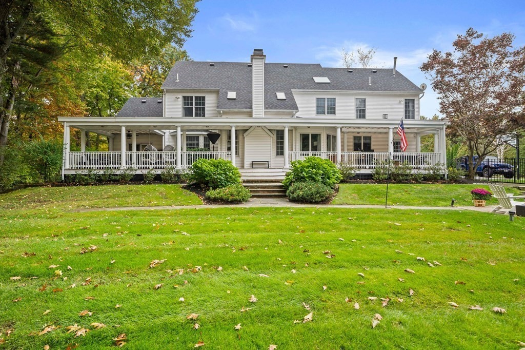 105 Waterman Road Canton, MA 02021 - Photo 36 of 39 a front view of a house with a garden