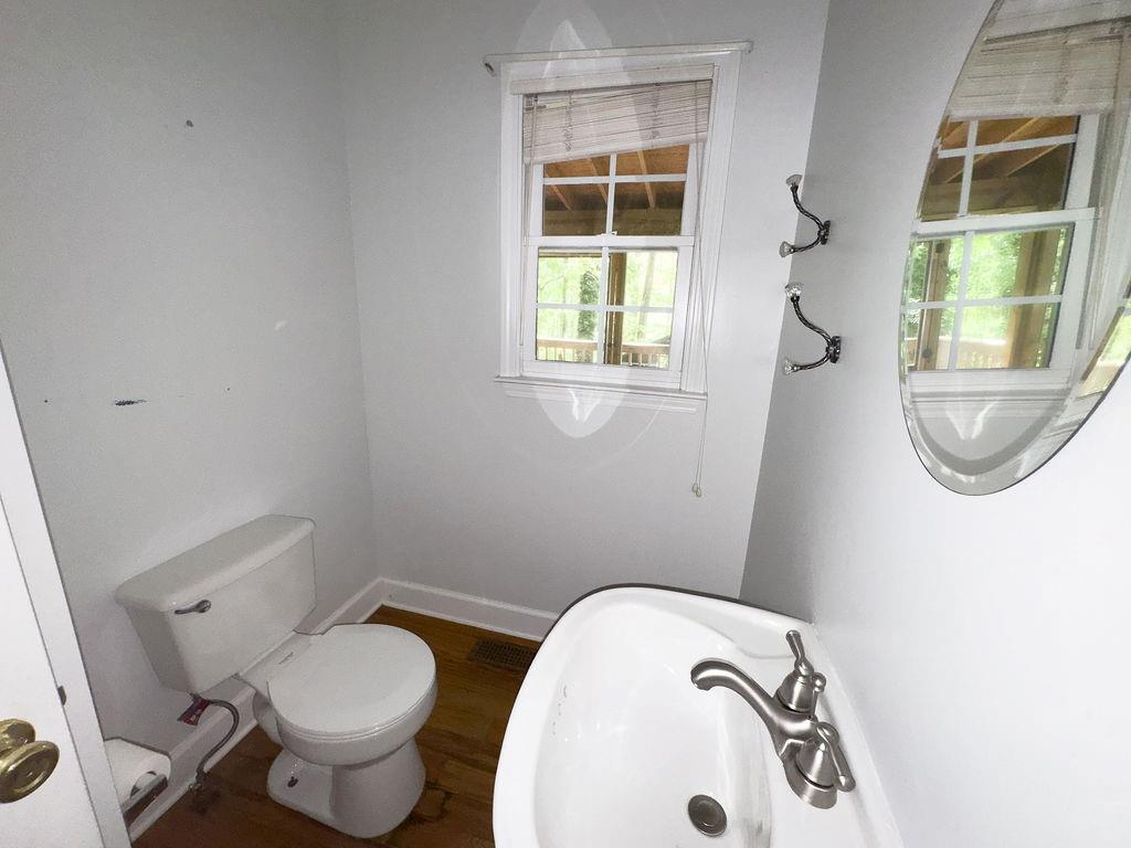 66 Stevenson Point Dallas, GA 30132 - Photo 18 of 39 a bathroom with a toilet and a sink