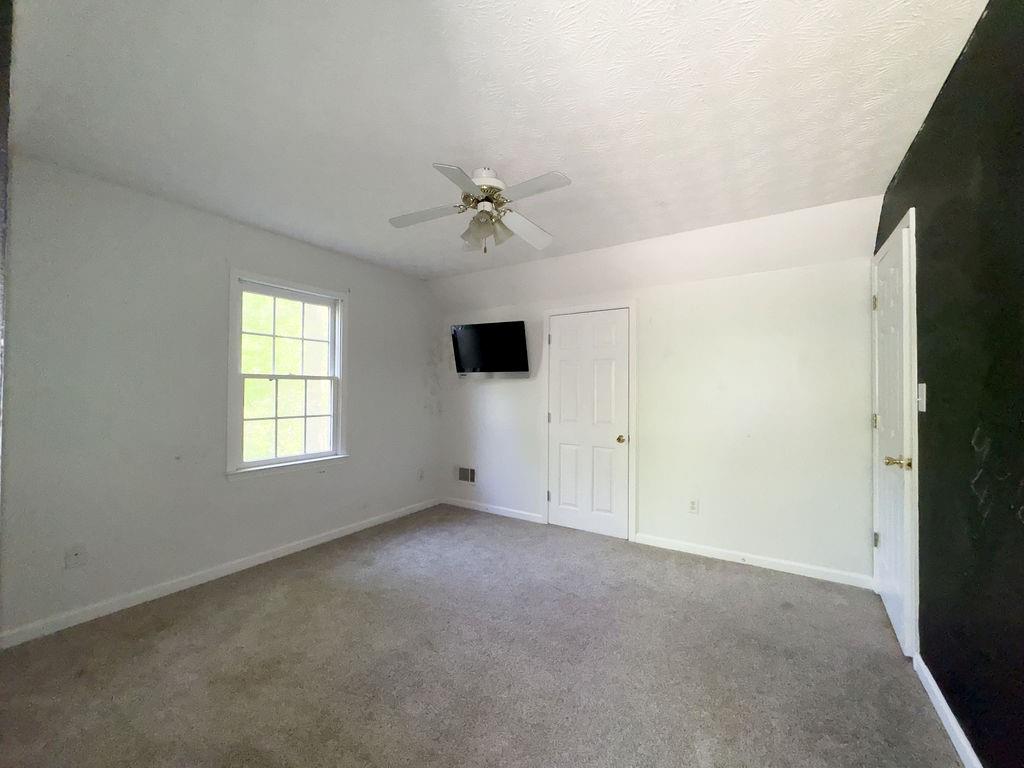 66 Stevenson Point Dallas, GA 30132 - Photo 29 of 39 a view of an empty room with a window