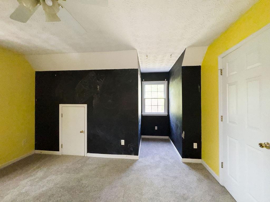 66 Stevenson Point Dallas, GA 30132 - Photo 35 of 39 a view of livingroom with furniture and a window