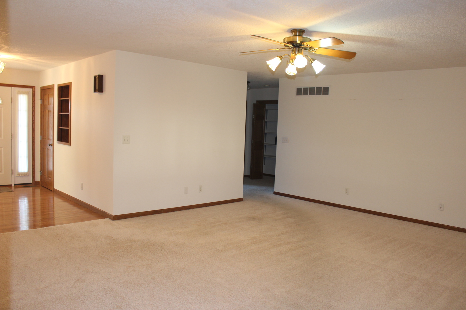 3 Delmar Drive Clinton, IL 61727 - Photo 18 of 44 a view of a livingroom with a chandelier