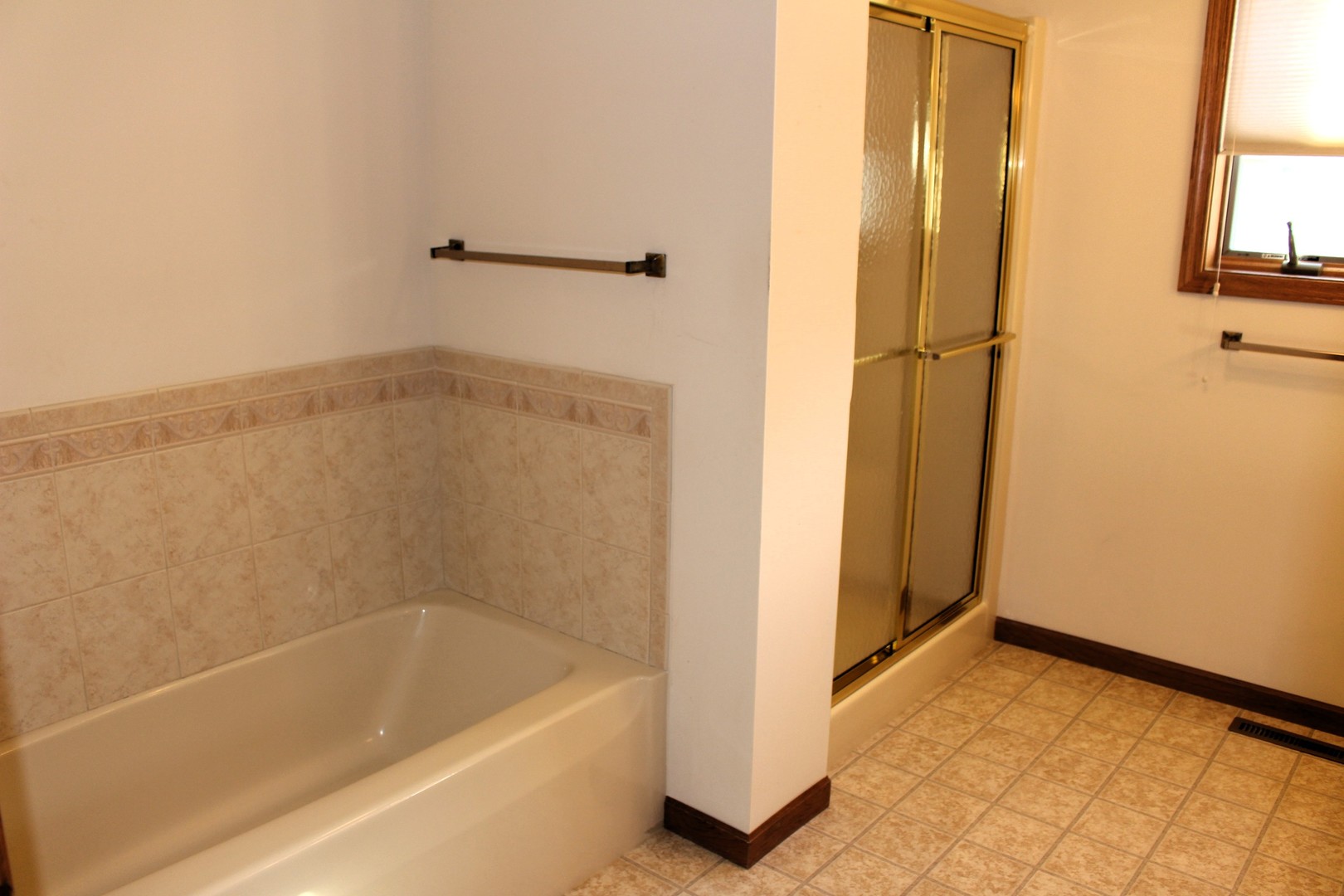 3 Delmar Drive Clinton, IL 61727 - Photo 23 of 44 a bathroom with a tub