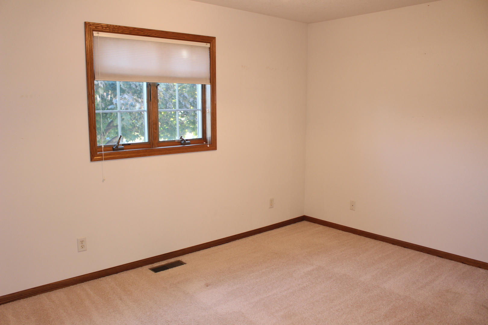 3 Delmar Drive Clinton, IL 61727 - Photo 26 of 44 an empty room with a window