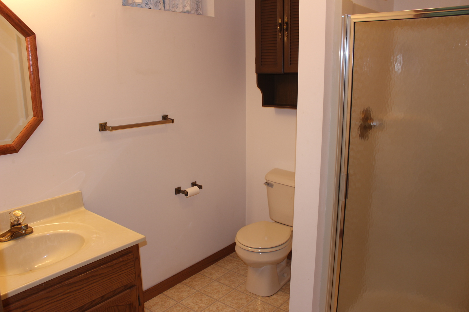 3 Delmar Drive Clinton, IL 61727 - Photo 40 of 44 a bathroom with a sink a toilet and shower