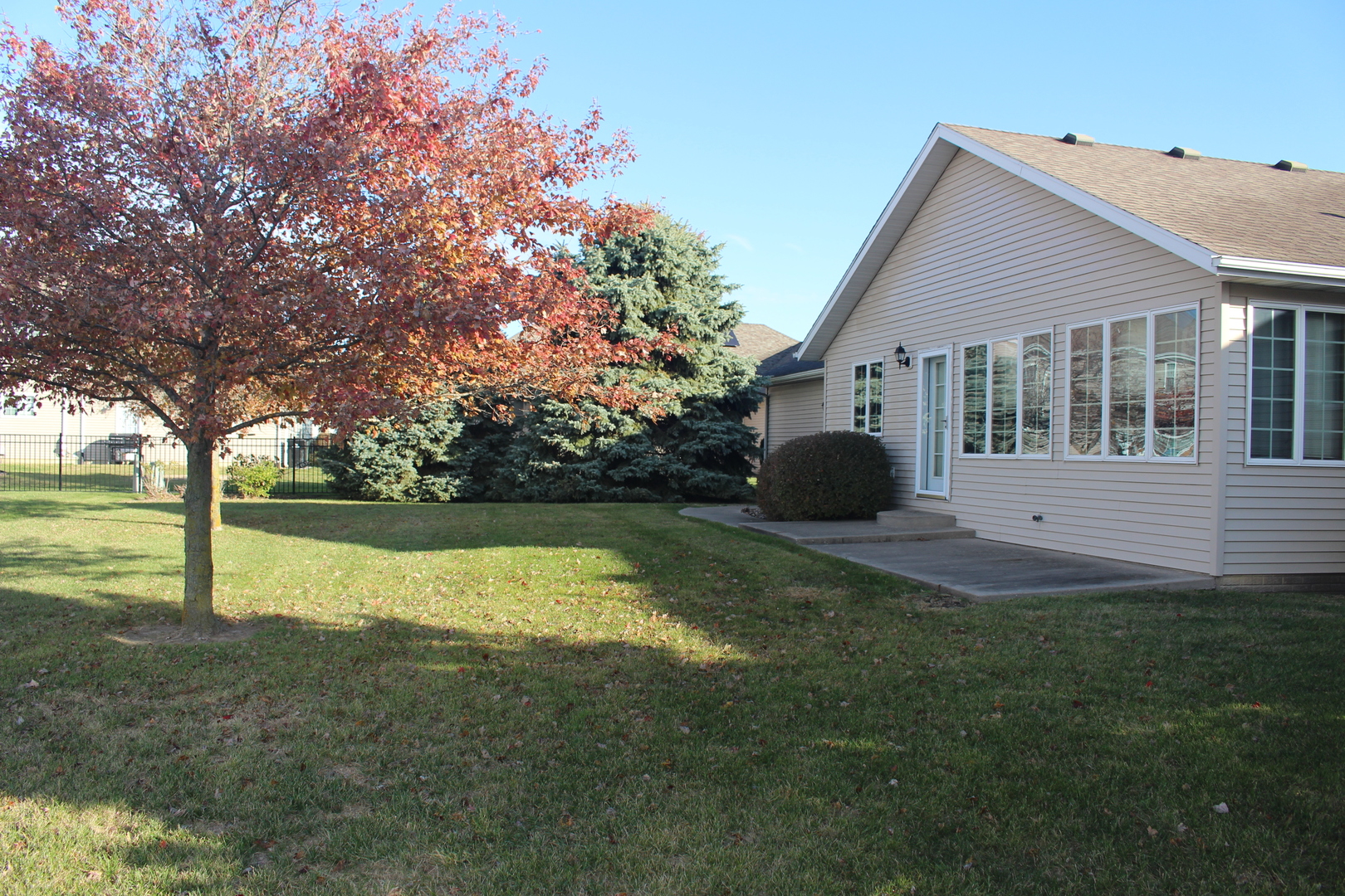 3 Delmar Drive Clinton, IL 61727 - Photo 4 of 44 a view of a house with a yard and sitting area