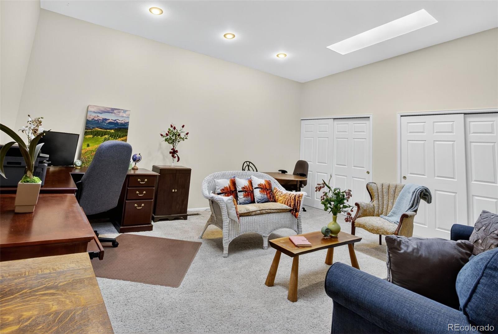 23660 Pondview Place, Unit E Golden, CO 80401 - Photo 18 of 26 a living room with furniture