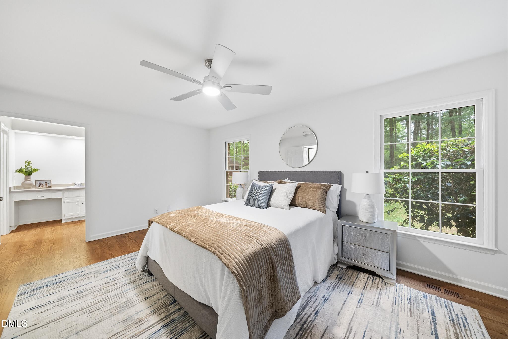 3404 Timberwood Court Raleigh, NC 27606 - Photo 21 of 45 a bed room with a bed and a window