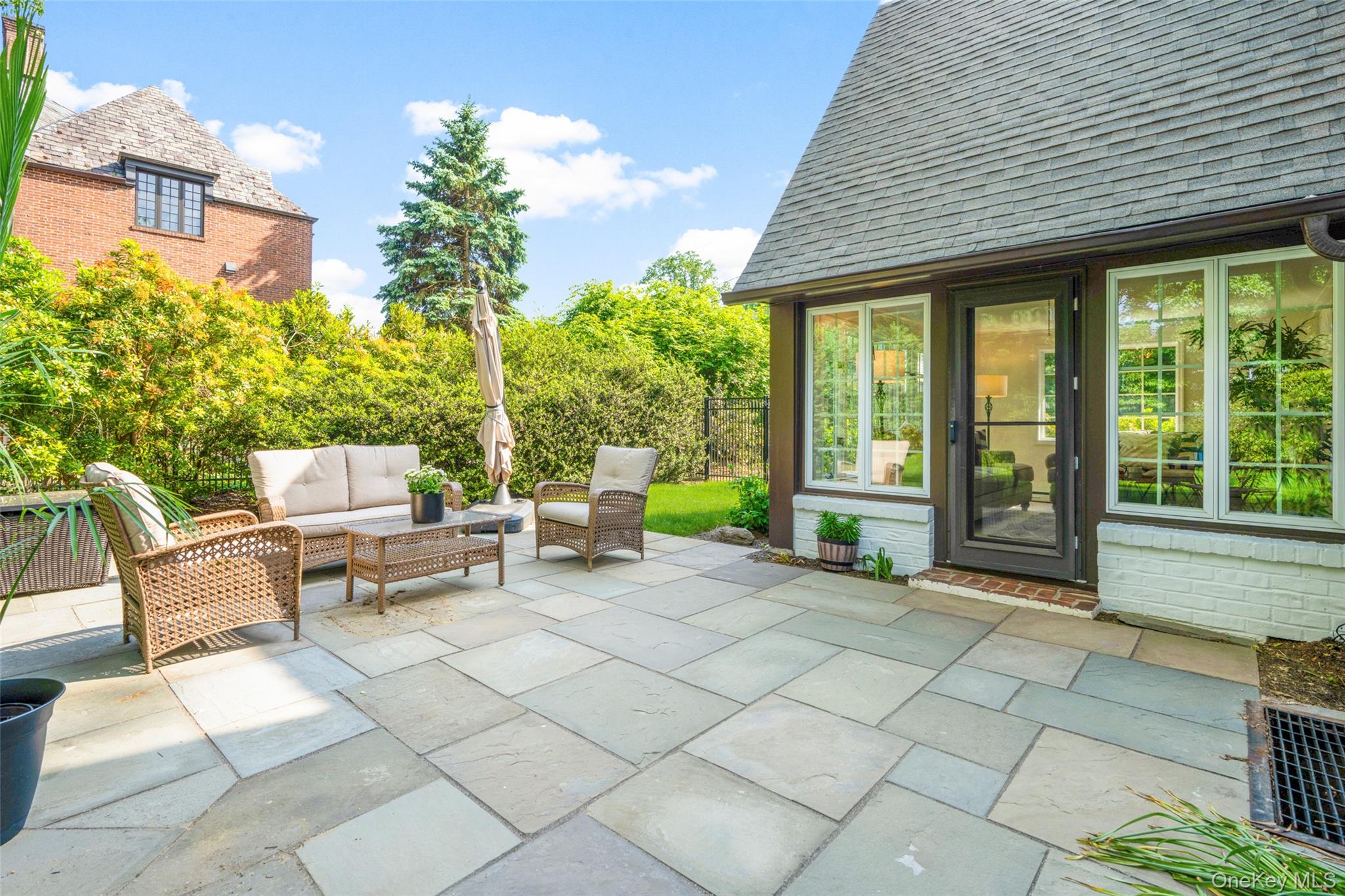 63 Rye Road Rye, NY 10580 - Photo 29 of 50 Inviting patio offering seamless indoor-outdoor flow and ample space for entertaining.
