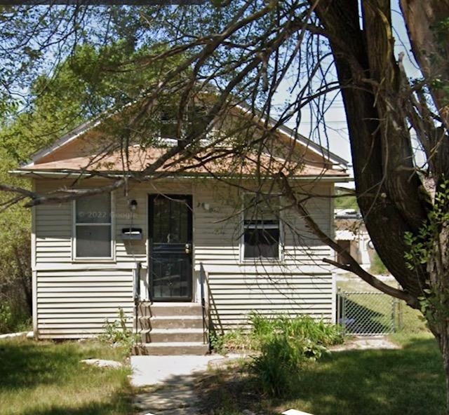 3860 Massachusetts Street Gary, IN 46409 - Photo 1 of 1 a view of a house with a large tree