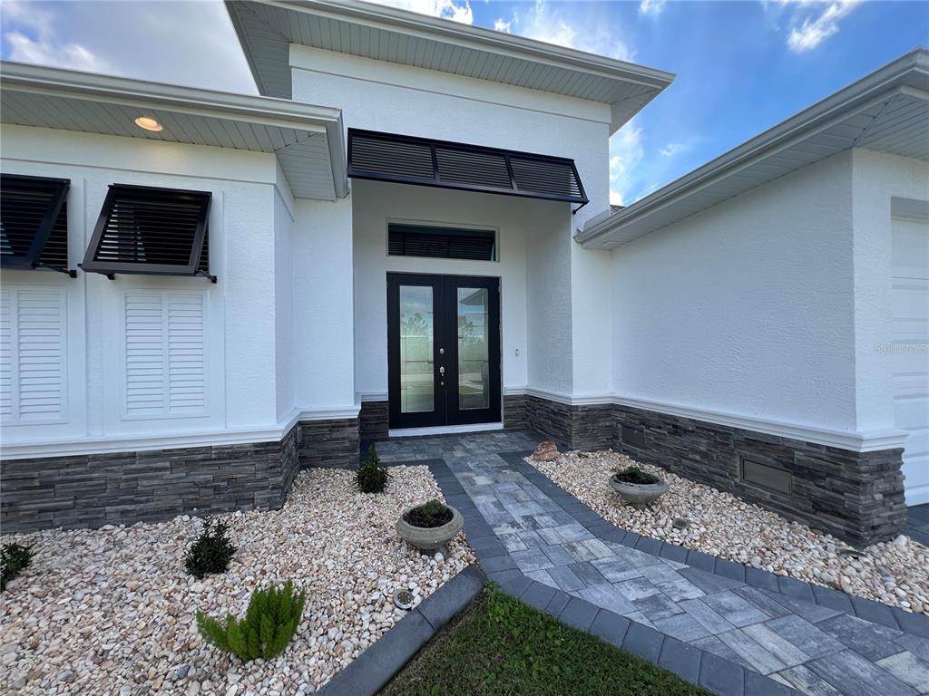 15419 Appleton Boulevard Port Charlotte, FL 33981 - Photo 2 of 43 a house view with a backyard space