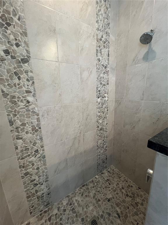 15419 Appleton Boulevard Port Charlotte, FL 33981 - Photo 24 of 43 a bathroom with a shower