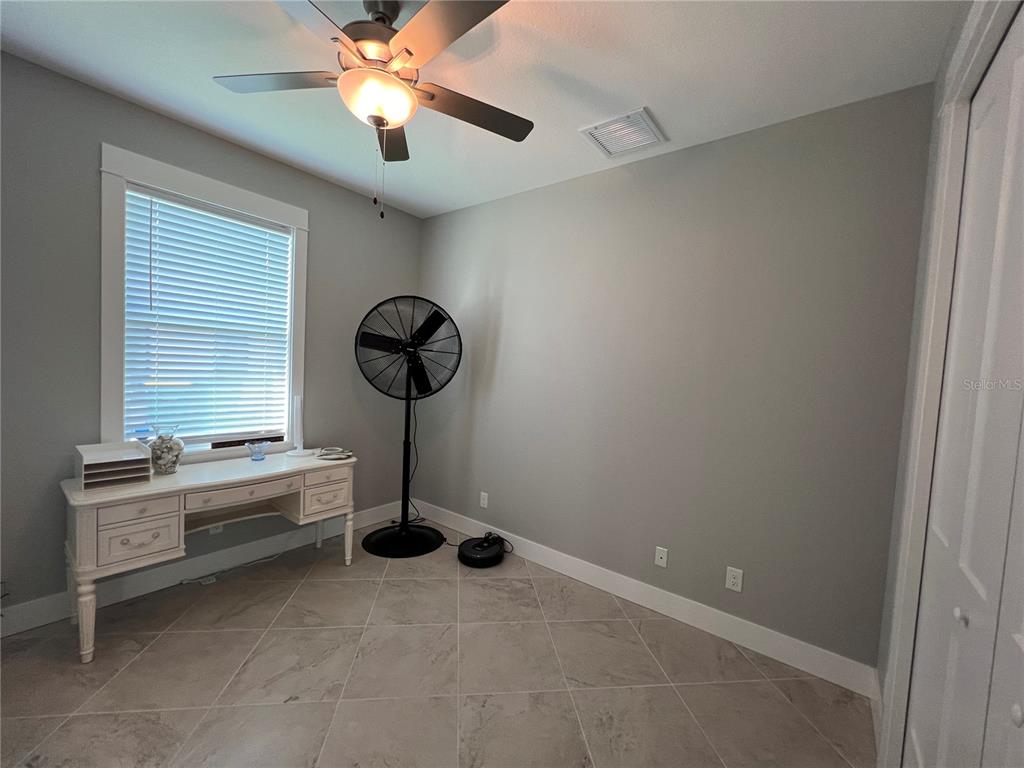 15419 Appleton Boulevard Port Charlotte, FL 33981 - Photo 28 of 43 a view of entryway with kitchen
