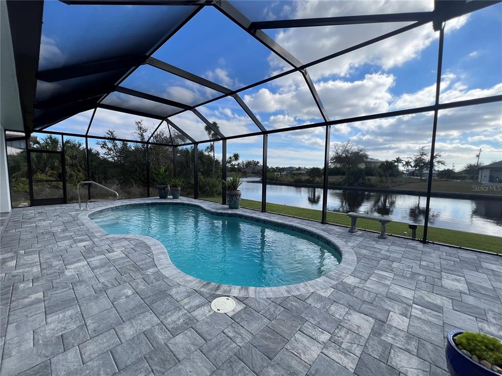 15419 Appleton Boulevard Port Charlotte, FL 33981 - Photo 38 of 43 a view of a swimming pool with a patio
