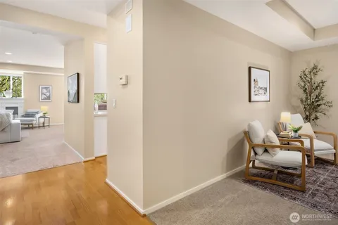 a work room with furniture and rug