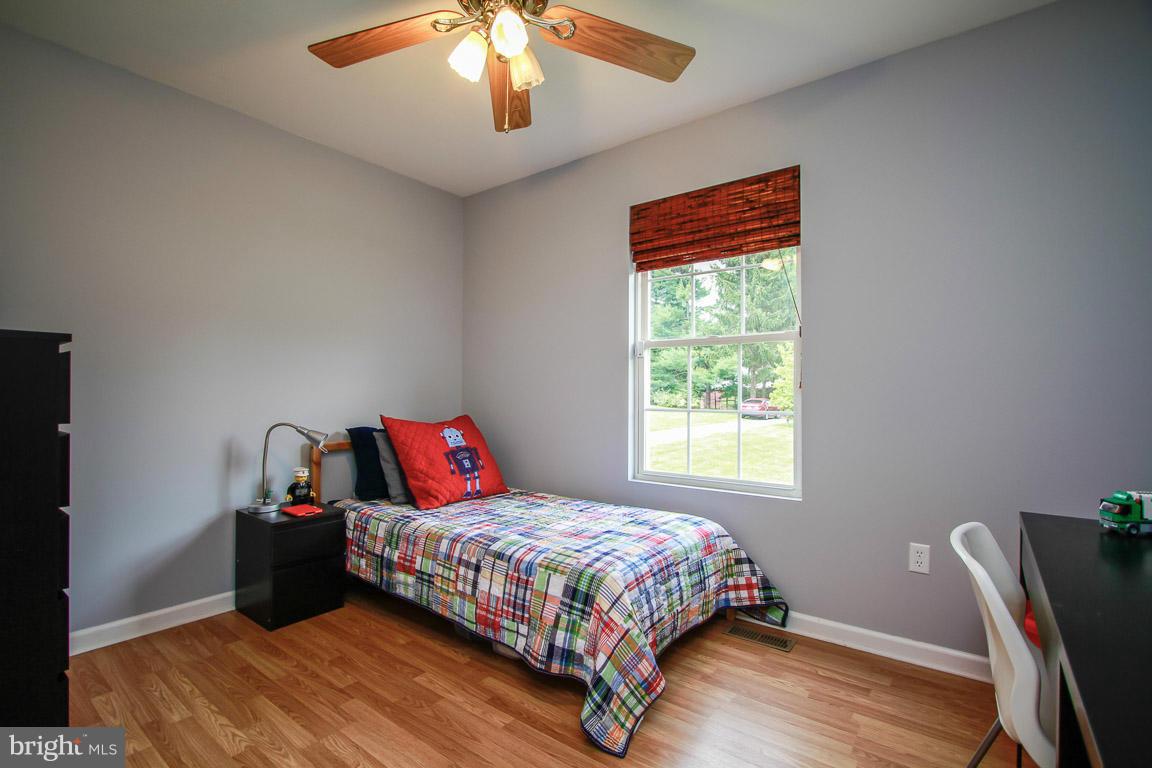 3237 Lineboro Road Manchester, MD 21102 - Photo 19 of 26 a bedroom with a bed and a window
