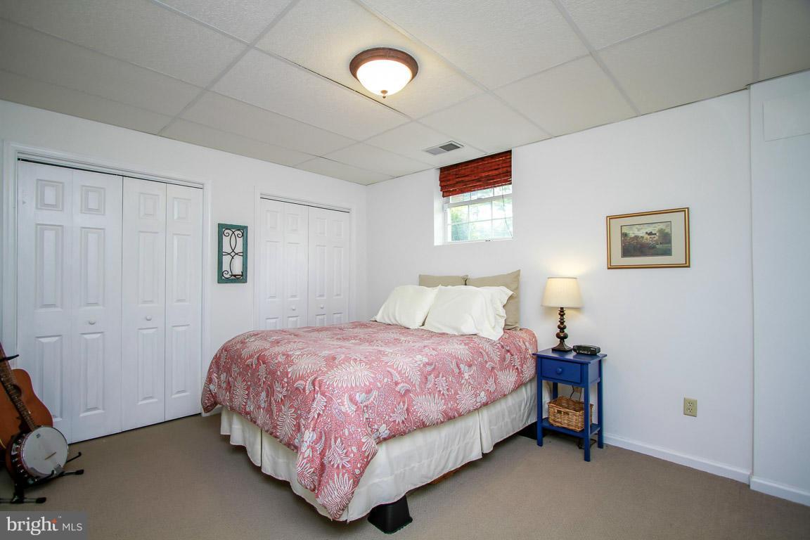 3237 Lineboro Road Manchester, MD 21102 - Photo 21 of 26 a bedroom with a bed and a window
