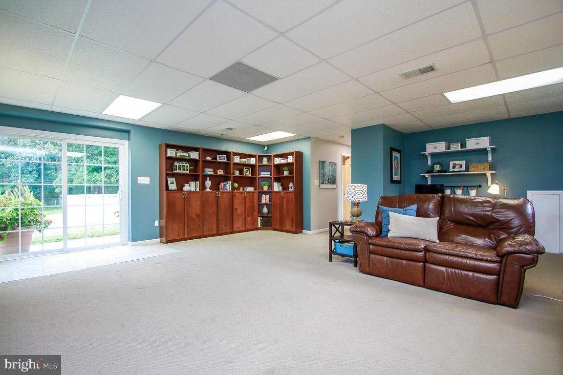 3237 Lineboro Road Manchester, MD 21102 - Photo 23 of 26 a living room with furniture and a large window