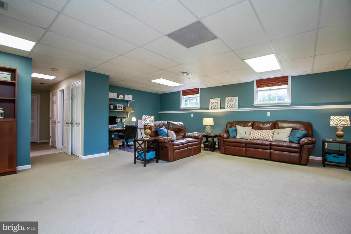3237 Lineboro Road Manchester, MD 21102 - Photo 24 of 26 a living room with furniture and a couch