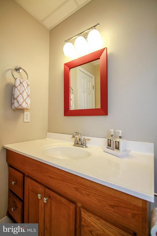 3237 Lineboro Road Manchester, MD 21102 - Photo 26 of 26 a bathroom with a sink and a mirror