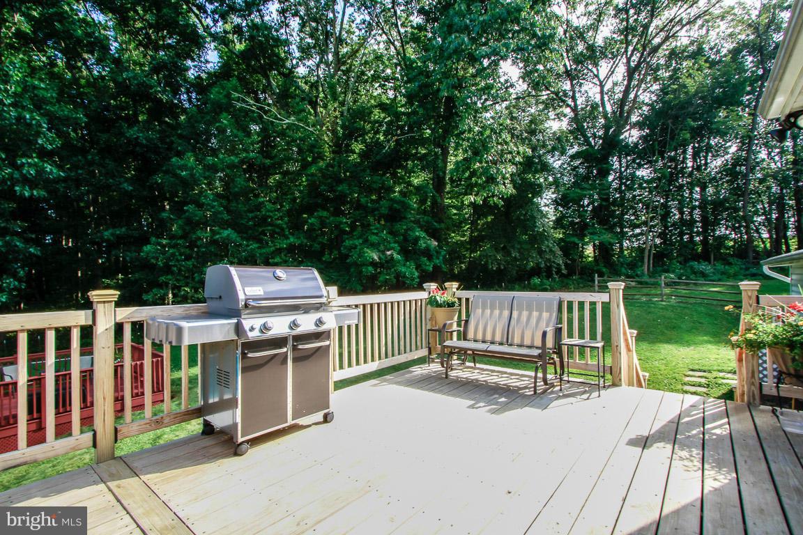 3237 Lineboro Road Manchester, MD 21102 - Photo 4 of 26 a view of small deck and a yard with swimming pool