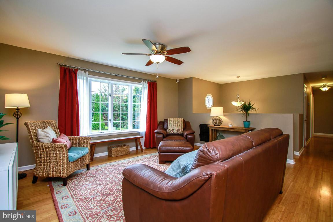 3237 Lineboro Road Manchester, MD 21102 - Photo 8 of 26 a living room with furniture and a large window