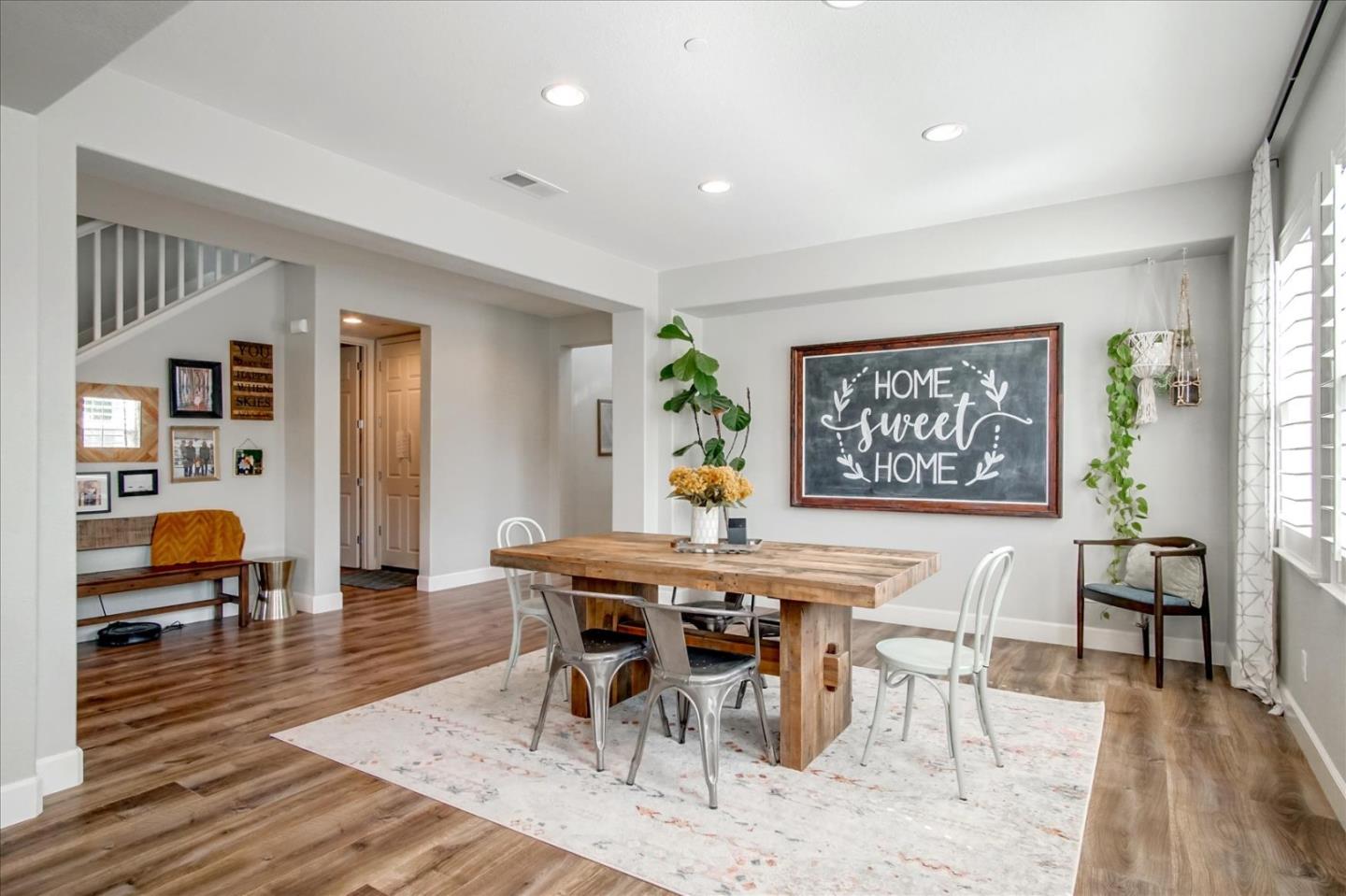 1130 Ruby Way Gilroy, CA 95020 - Photo 11 of 36 a view of a dining room with furniture and wooden floor