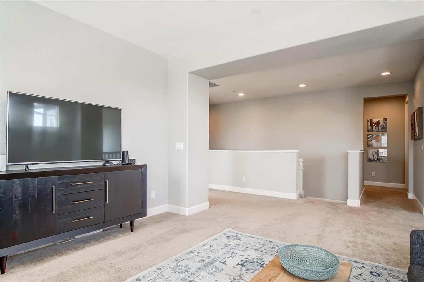 1130 Ruby Way Gilroy, CA 95020 - Photo 14 of 36 a spacious bathroom with a granite countertop sink and a mirror