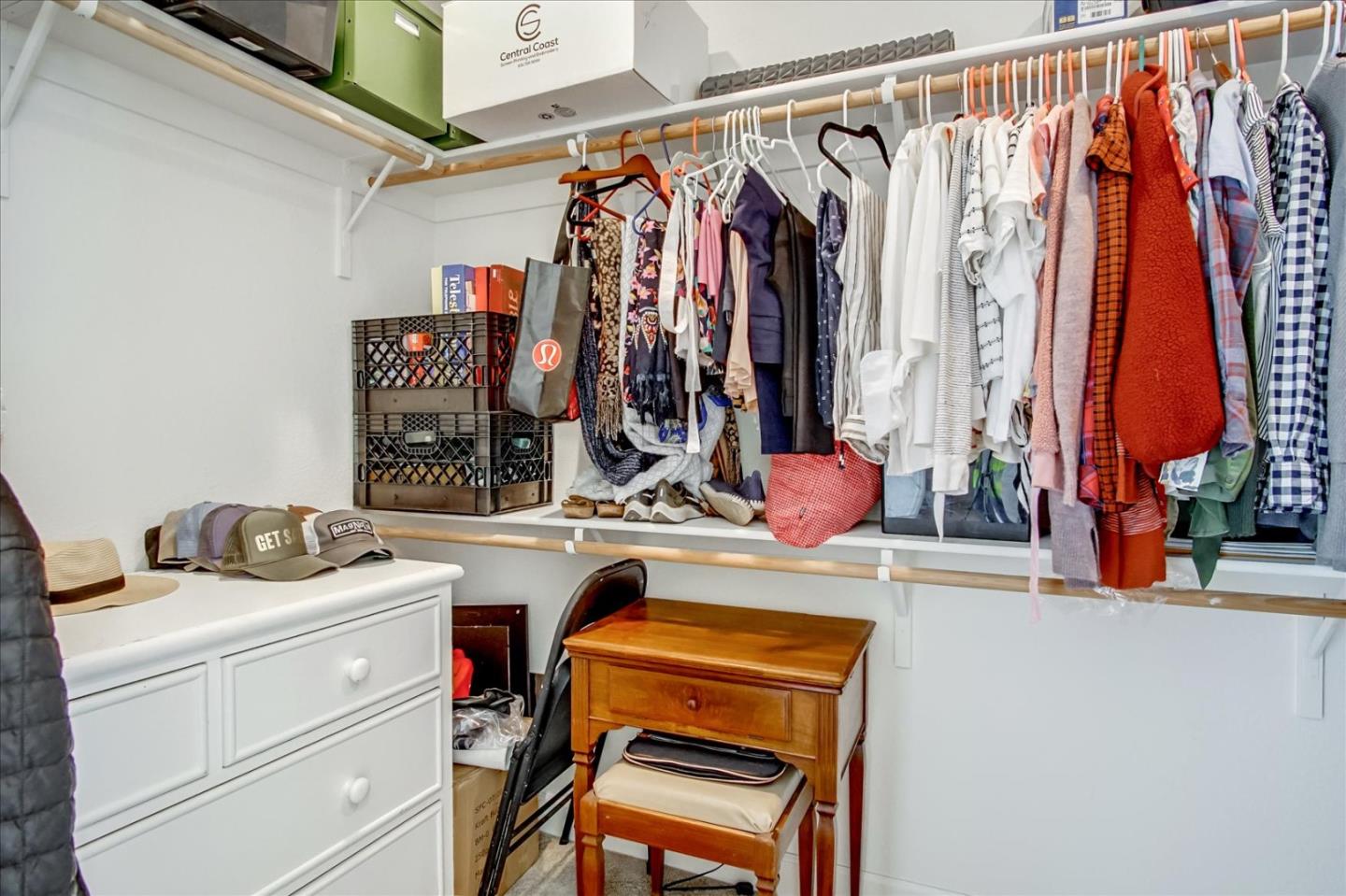 1130 Ruby Way Gilroy, CA 95020 - Photo 21 of 36 a view of walk in closet with clothes and shoes