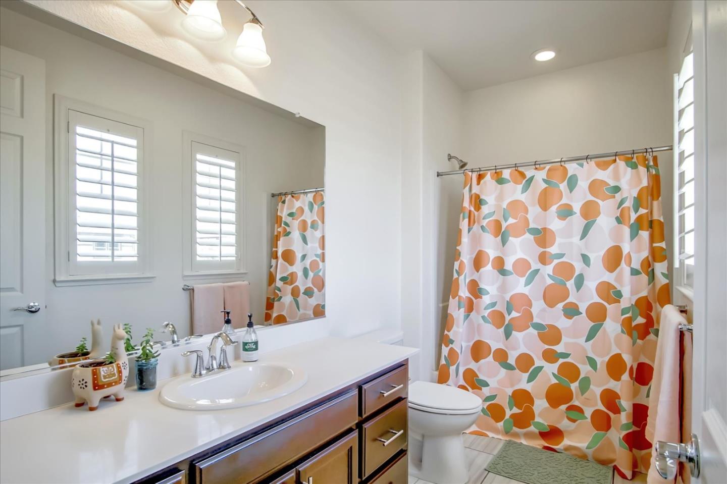 1130 Ruby Way Gilroy, CA 95020 - Photo 24 of 36 a bathroom with a sink toilet and shower
