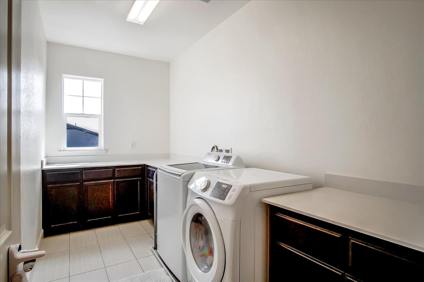 1130 Ruby Way Gilroy, CA 95020 - Photo 26 of 36 a utility room with dryer and washer