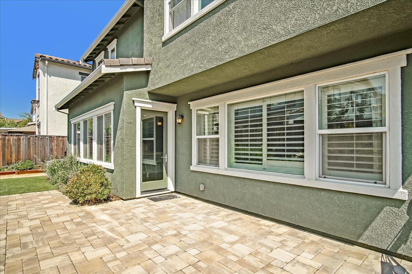 1130 Ruby Way Gilroy, CA 95020 - Photo 28 of 36 a view of a house with a backyard