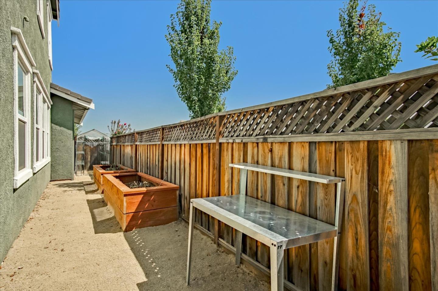 1130 Ruby Way Gilroy, CA 95020 - Photo 29 of 36 a view of a backyard with sitting area