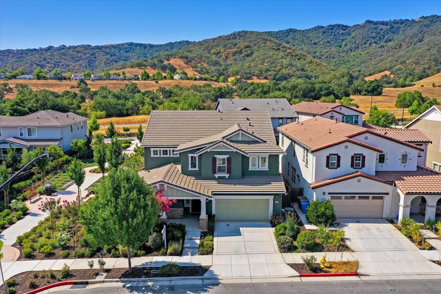 1130 Ruby Way Gilroy, CA 95020 - Photo 32 of 36 an aerial view of residential houses with outdoor space