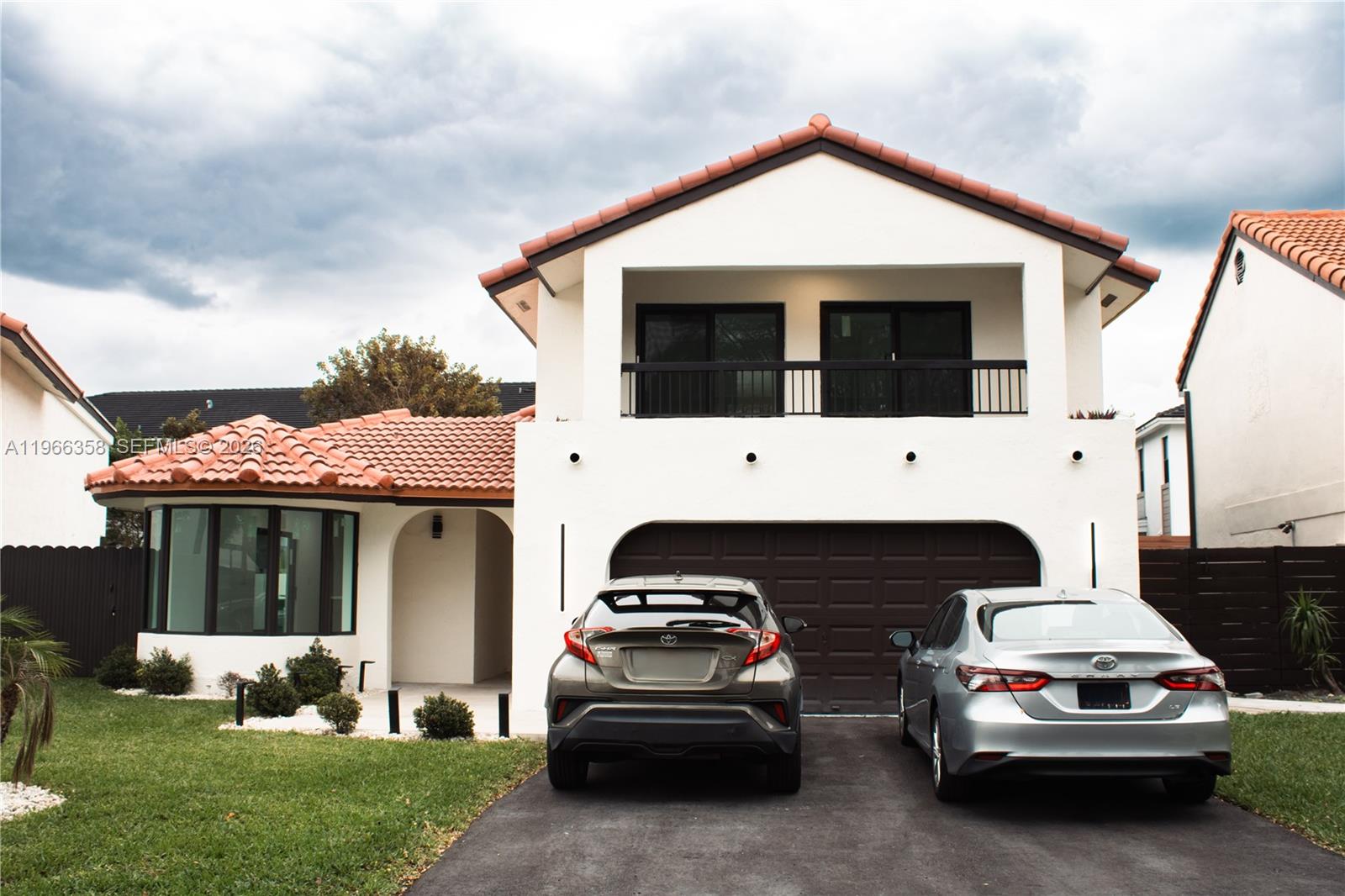 10433 Southwest 118th Court Miami, FL 33186 - Photo 1 of 32 a view of a car parked in front of a house