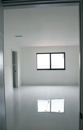 a white bath tub sitting in a bathroom