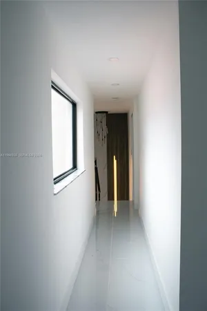 a white bath tub sitting in a bathroom