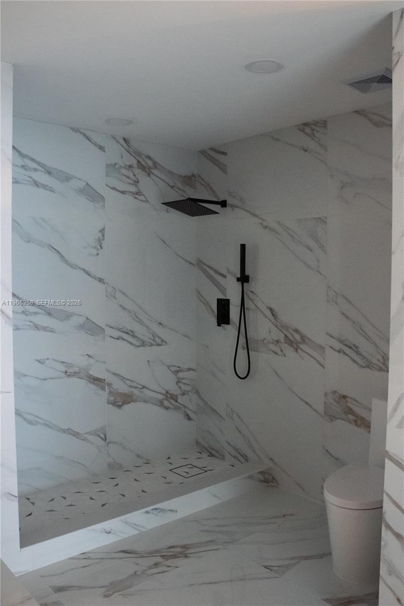 10433 Southwest 118th Court Miami, FL 33186 - Photo 27 of 32 a bathroom with a shower