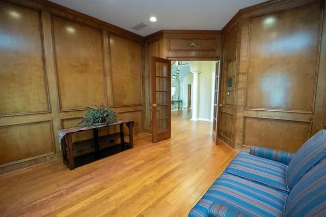 a room with a bed and furniture