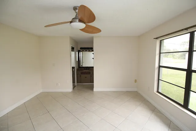 a view of empty room with a window